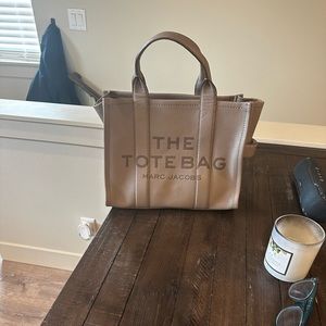 Marc Jacobs the tote leather bag- color is Cement